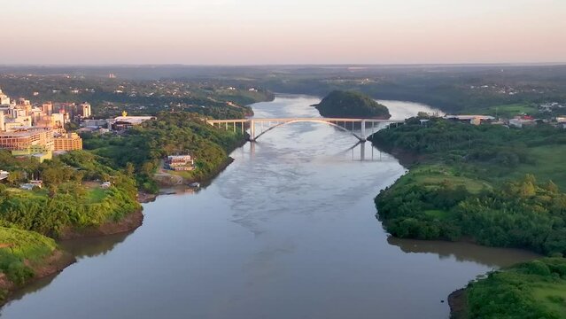 Ponte da Amizade in Foz do Igua&ccedil;u. Aerial view the Friendship Bridge that marks the border between Brazil and Paraguay and connects Foz do Igua&ccedil;u to Ciudad del Este. Paran&aacute; river.
