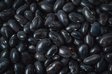 Obraz premium Detailed image showcasing the natural texture and variety of whole raw black turtle beans