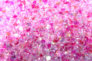 Close Up of Color Pink Shiny Confetti Glitter On White Background