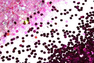 Close Up of Color Shiny Confetti Glitter On White Background
