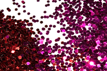 Close Up of Color Shiny Confetti Glitter On White Background