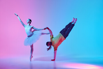 Classic and sport fusion. Beautiful young girl, ballet dancer making creative dance collaboration...