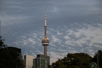 CN Tower - Toronto skyline - cloudy sky - evening light - urban landscape. Taken in Toronto, Canada.