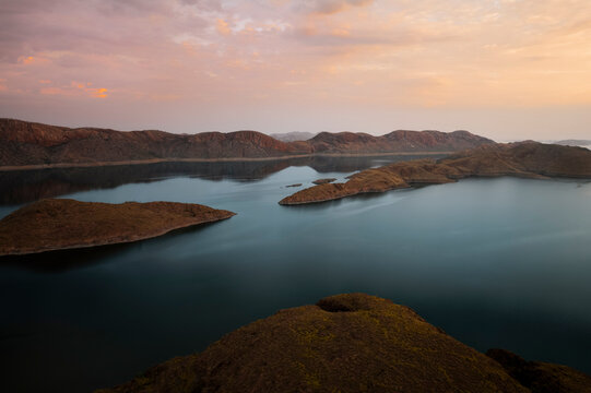 Aerial view of mountain peak at sunset, Lake Argyle, Western Australia.