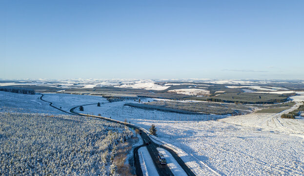 Aerial view of countryside meadow at sunset, Carter Bar, Scotland, United Kingdom.