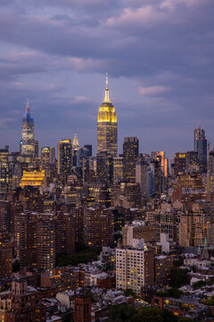 Aerial view of modern skyscrapers at sunset, New York City, United States.