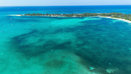 Aerial view of turquoise waters and sandy shore at Jaws Beach, Delaporte Point, Nassau, The Bahamas.