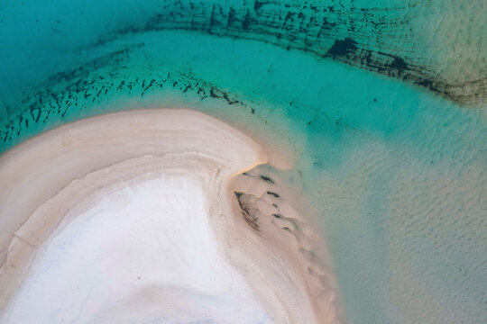 Aerial view of turquoise waters and sandy beach at Noosa Spit, Noosa Heads, Queensland, Australia.