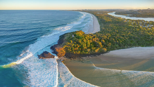 Aerial view of natural sandy beach and blue ocean at Fingal Head Beach, New South Wales, Australia.