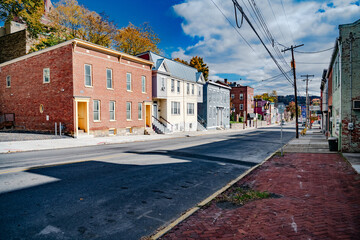 street with old colorful houses in the historic center of Cumberland in Maryland. Architecture of old America.