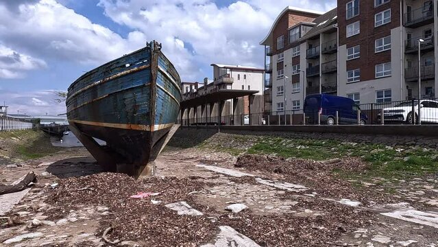 MVF Watchful and the nearby coastal buildings in Ayr town on the southwest coast of Scotland, UK