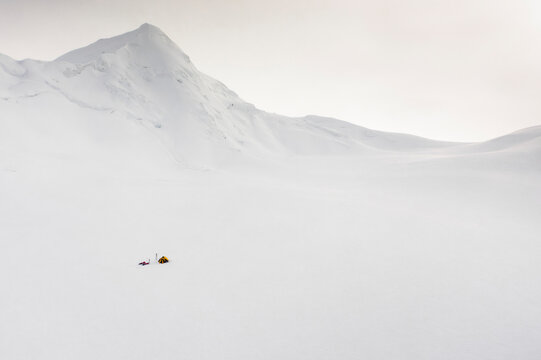 Aerial view of snow-covered Braldu glacier and Lukpe La Pass during a ski pulka expedition, Gilgit-Baltistan, Pakistan.