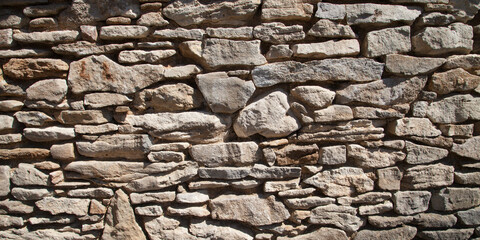 Détail d'un mur bâti en pierres sèches