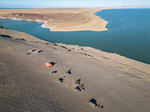 Aerial view of desert landscape with rock formations and sand, Camp side Airag Lake, Zavhan, Mongolia.