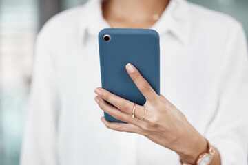 Typing, business woman and smartphone in office for social media post, communication and chat. Online conversation, female person and mobile tech in workplace for internet contact or web browsing