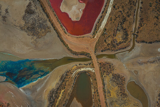 Aerial view of abstract forms and patterns in post-coal mining area, St Kilda, South Australia, Australia.