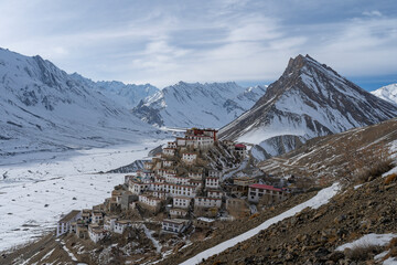 Aerial view of Key Monastery in snow-covered Spiti Valley, Himachal Pradesh, India.