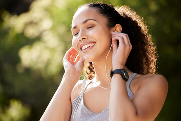 Fitness, calm and woman in park with music for sports, exercise or audio for motivation. Outdoor,...