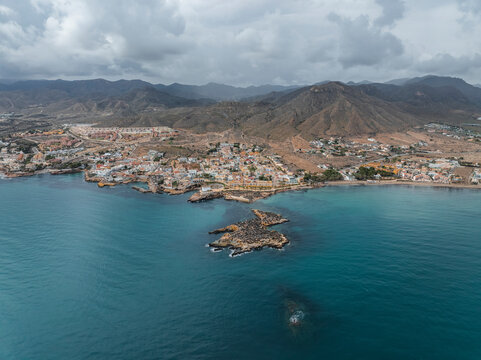 Aerial view of beautiful coastal town Isla Plana Island, Cartagena, Spain.