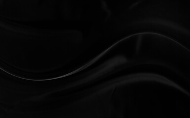 Black gray satin dark fabric texture luxurious shiny that is abstract silk cloth background with patterns soft waves blur beautiful.