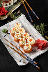 Exquisite Philadelphia Roll with Caviar on a Sophisticated Dining Set