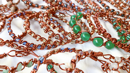 Heap of handmade bracelet. Wire wrapped jewellery.