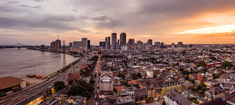 Aerial view of urban skyline with skyscrapers and Mississippi River, New Orleans city center, Marigny, Louisiana, United States. - Powered by Adobe