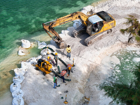Aerial view of construction and dredging project in Addu Atoll, Maldives.