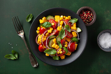 healthy vegetarian tomato sweet corn salad with cucumber and basil