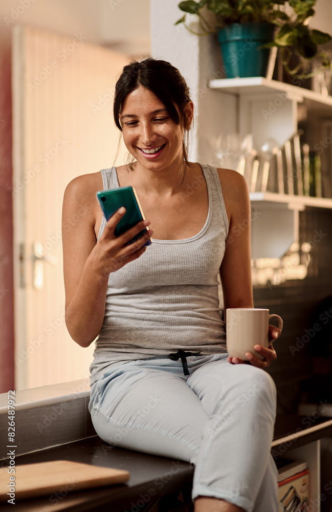 Poster Kitchen, laugh and woman with cellphone in home for social media, chat and online comedy with contact. House, girl and smartphone for networking, browsing and scrolling in morning with coffee cup