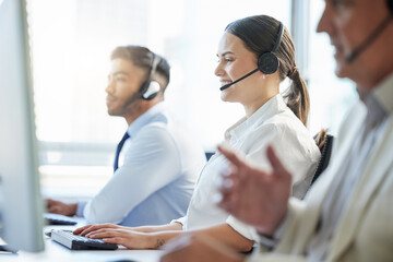 Call center, woman and smile with headphone, conversation and communication in workplace. Group,...