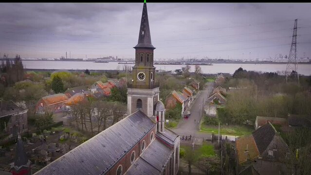 Aerial video of Onze Lieve Vrouw-Hemelvaartkerk in Doel Belgium