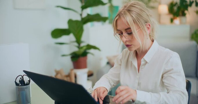 Confident Businesswoman on Laptop