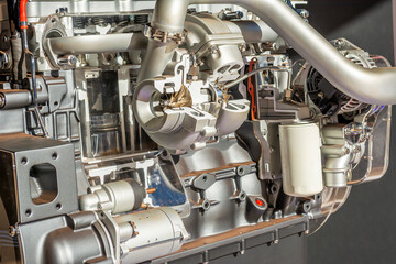 Modern tractor electric engine close up