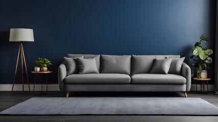 Gray sofa in a modern living room against a dark blue background.