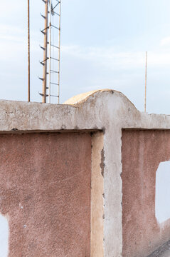 Weathered Wall with Ladder and Poles, Dahab, Red Sea, Egypt