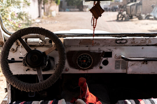 Old Car Interior with Steering Wheel and Dashboard, Dahab, Red Sea, Egypt