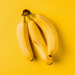 Isolated bananas, yellow background