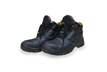 Old black safety shoes for work on white background, shoes made of good quality leather and...