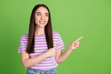 Photo portrait of pretty young girl point look empty space wear trendy striped violet outfit...