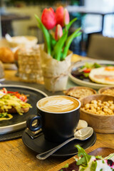 Cup of coffee on a brunch table