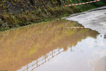 muddy flood, calm while lowering already