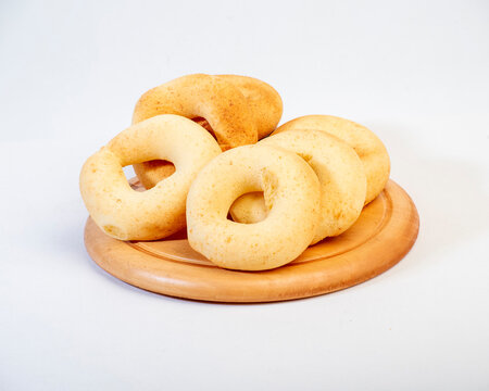 group of pandebonos isolated white over wood rable