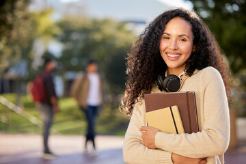 Books, education and portrait of student woman on college or university campus for development or...