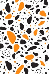 Fototapeta premium Abstract black and orange shapes on a white background, creating a dynamic modern design.