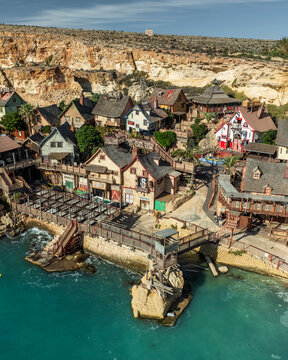 Aerial view of beautiful coastal village by the sea, Mellieha, Malta.