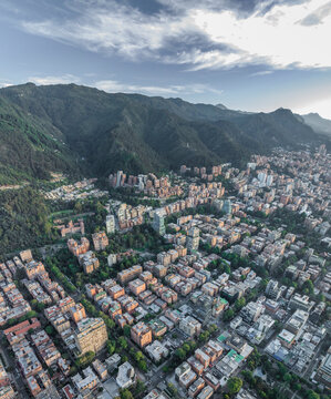 Aerial view of urban highrise buildings and residential houses in Bogota, Colombia.