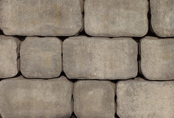 A background of gray stone tiles.