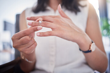Divorce, hand and wedding ring with person in home, closeup for breakup, conflict or infidelity....