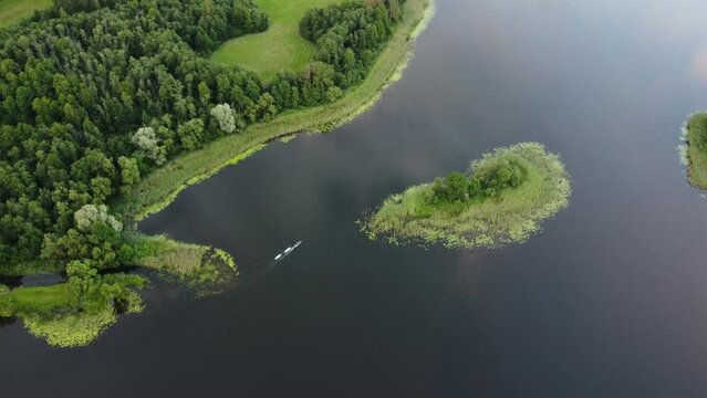 Lake with Boat and Islands. Summer. Latvia, Dagda